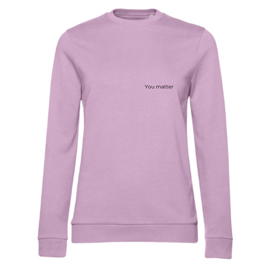 Sweater met tekst geborduurd