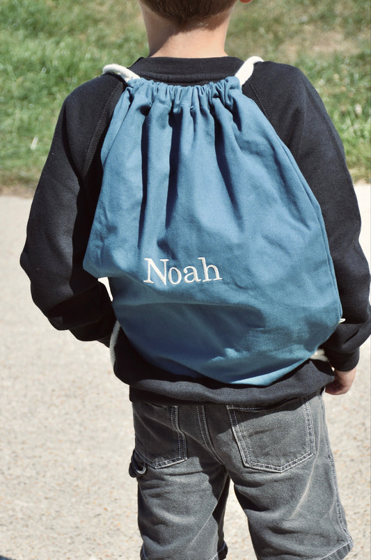 Turnzak met geborduurde naam